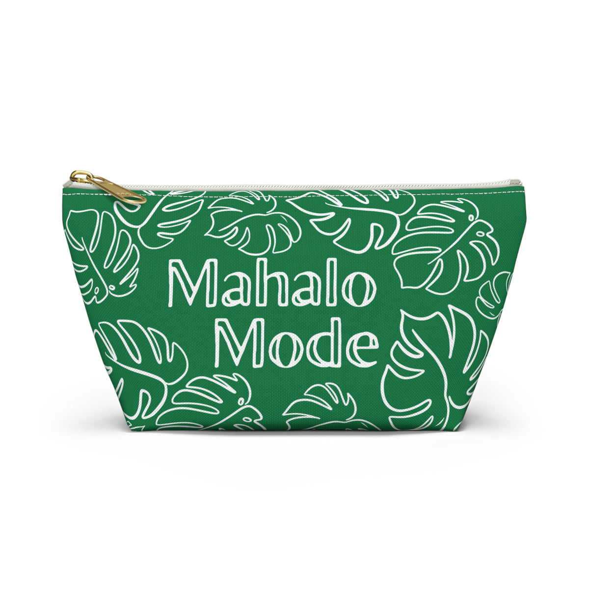 A green zippered pouch with a white tropical monstera leaf pattern and the words 'Mahalo Mode' printed in white on the front, featuring a gold zipper pull, set against a plain white background.