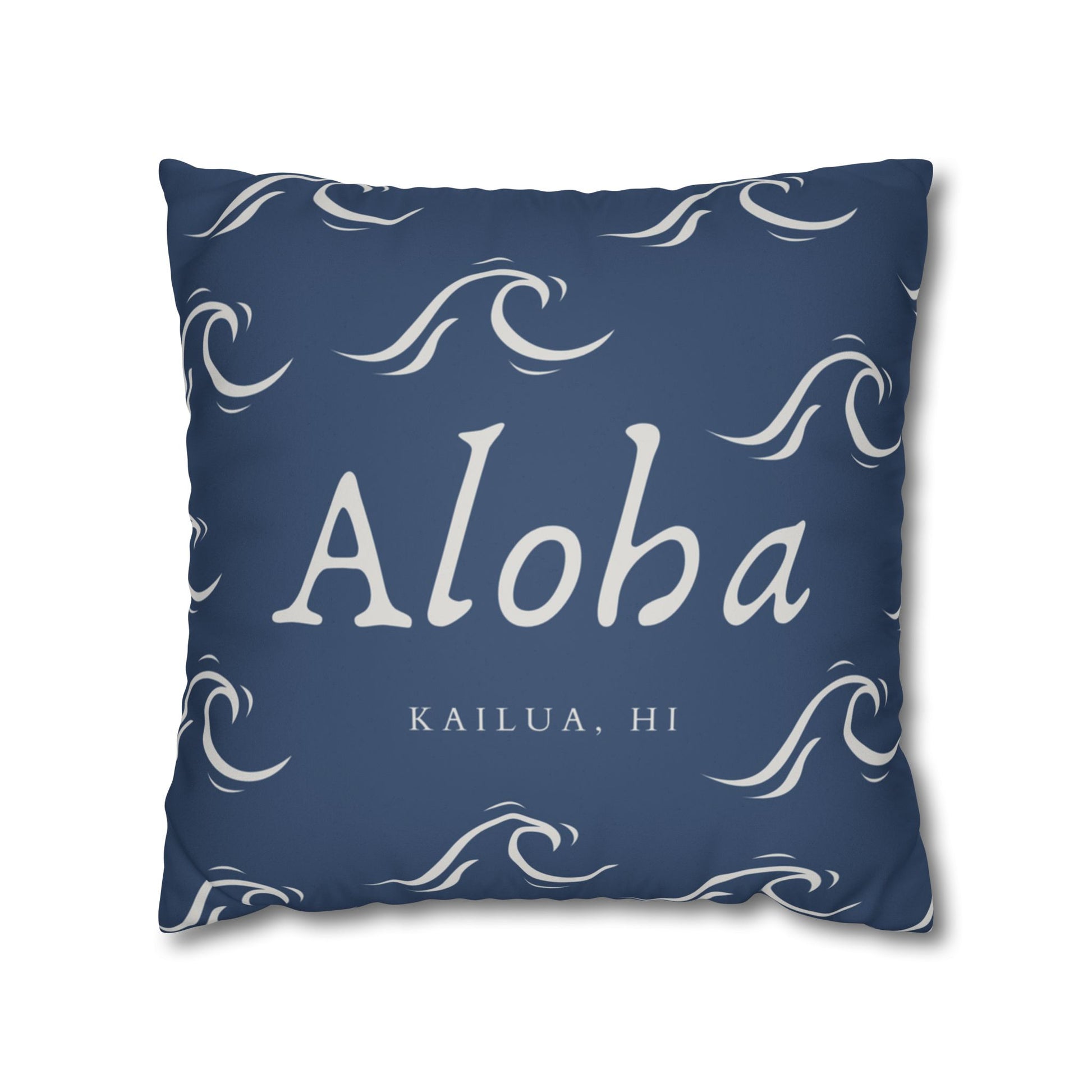 A square throw pillow in navy blue with white wave patterns and the text 'Aloha' and 'KAILUA, HI' printed on the front, shown against a plain white background.