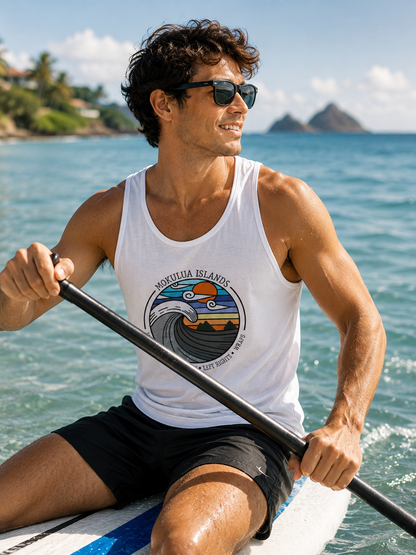 A man paddleboarding on the ocean wearing a white tank top with a colorful 'Mokulua Islands' graphic, black shorts, and sunglasses, with tropical islands in the background.