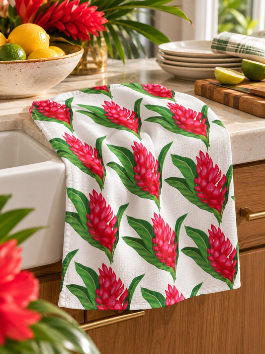 Ginger Blossom Kitchen Towel — Tropical ginger blossom kitchen towel casually draped beside a farmhouse sink in a bright island-style kitchen.