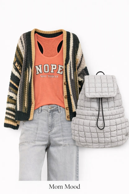 A styled outfit set featuring a knit cardigan with green, beige, and black stripes, a coral orange tank top with 'NOPE not today' printed on the front, light-wash gray jeans, and a light gray quilted backpack, labeled 'Mom Mood' at the bottom.